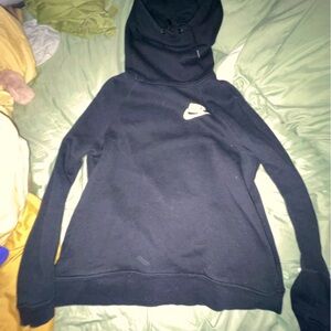 Cozy, black Nike sweatshirt for women for fall or winter.